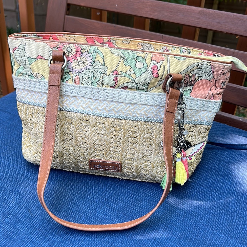 Sakroots straw and canvas purse with charms. Great condition.